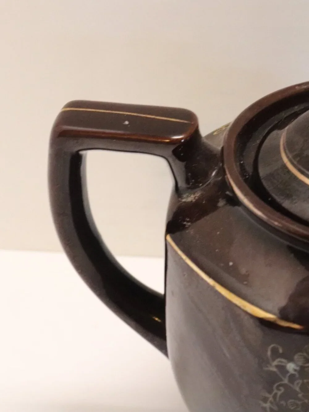 A Porcelain Pitcher made in Japan with Japan Written on Bottom Black